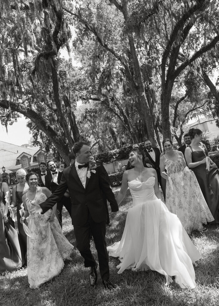 Black and white bridal portrait with a calla lily bouquet at Epping Forest Yacht & Country Club