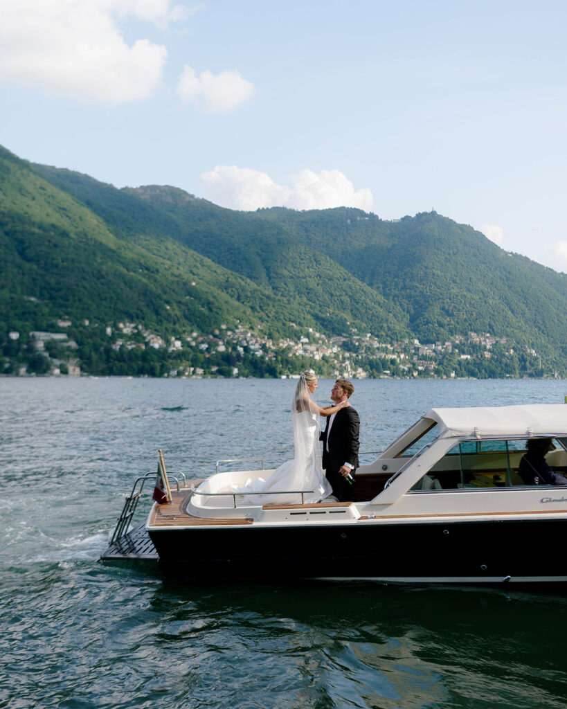 Bride and groom cruising Lake Como on a private boat