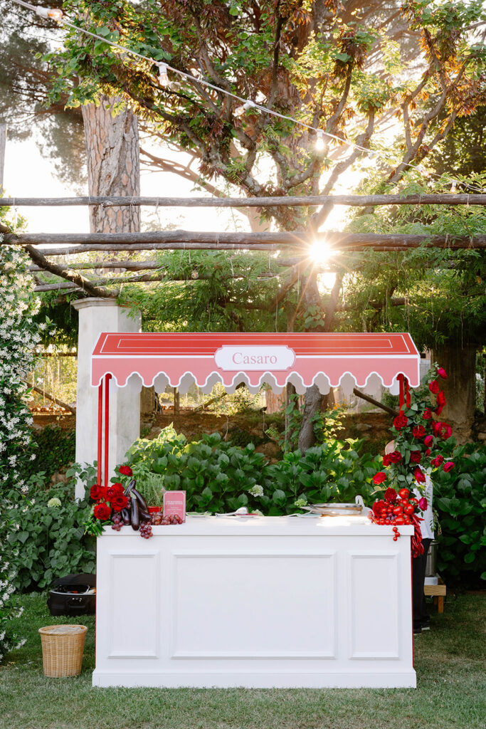 Pastel pink market stall at a Villa Cimbrone wedding welcome celebration